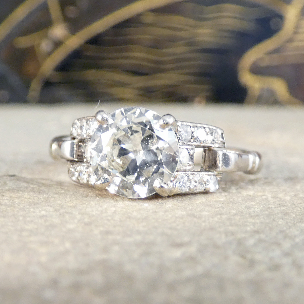 Diamond ring with a blurred decorative background