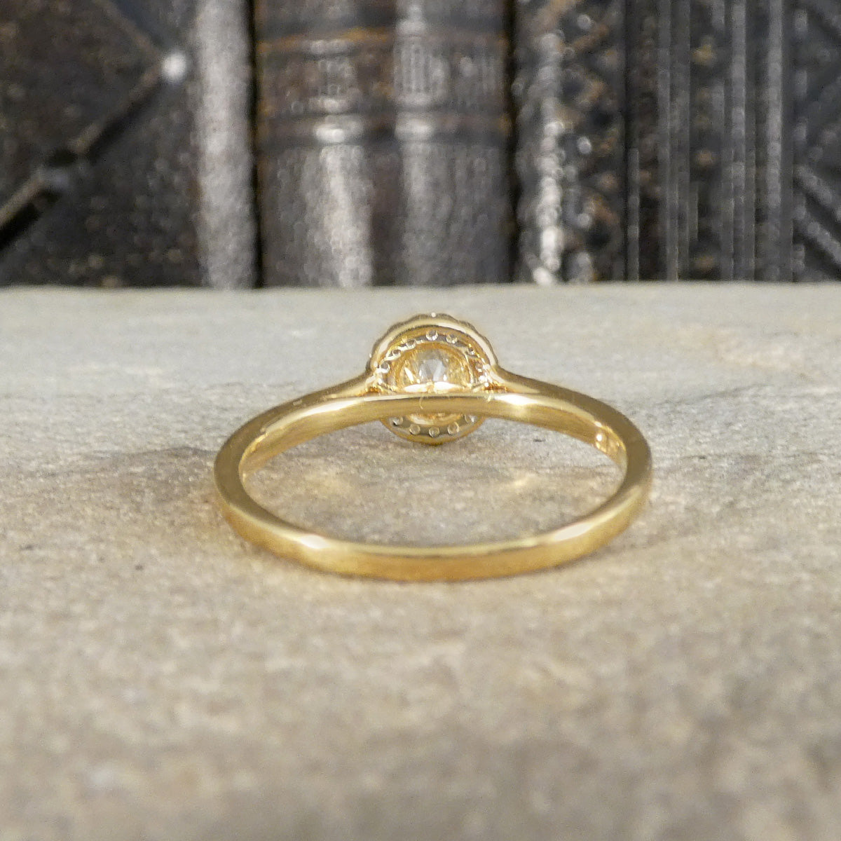 Back view of diamond cluster ring showing the under support of the ring.