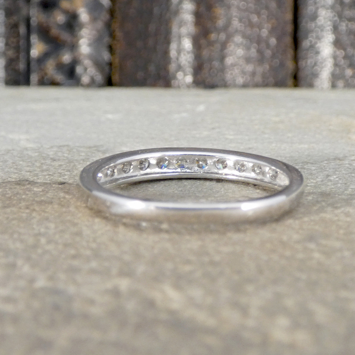 Diamond half eternity ring in 9ct white gold shown from behind.