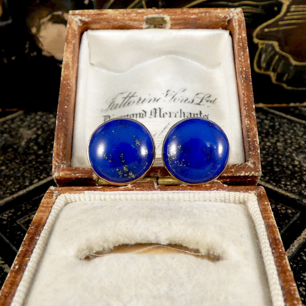Large blue Lapis Lazuli stud earrings in 9ct yellow gold displayed in a vintage jewellery box.
