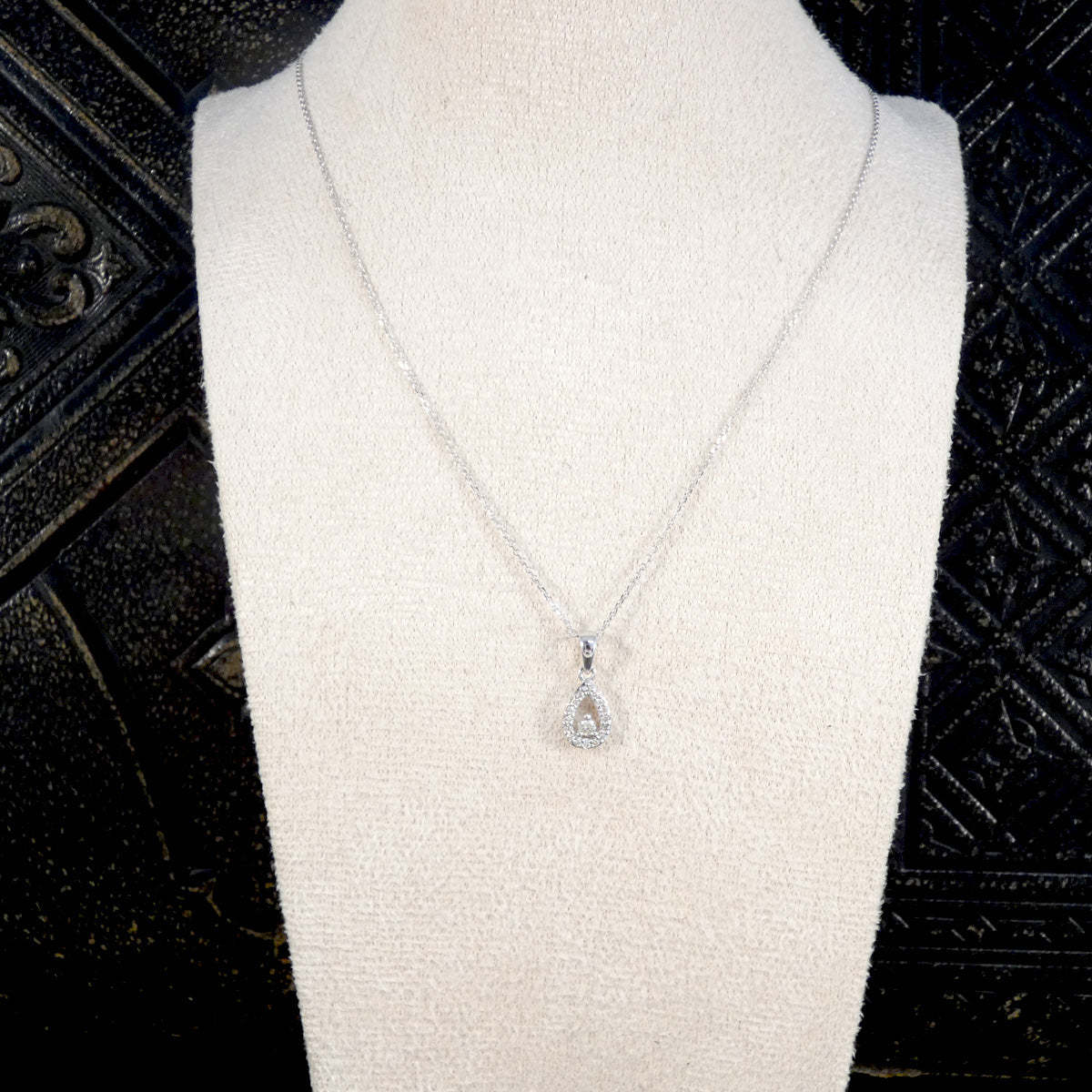 diamond teardrop shaped necklace in 9ct white gold.