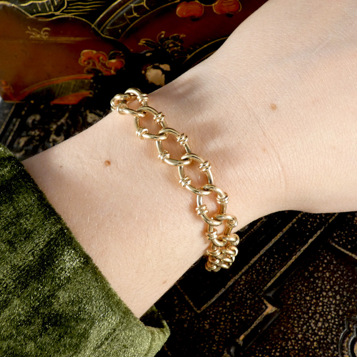 Gorgeous vintage 9ct yellow gold solid link bracelet shown worn on the wrist.
