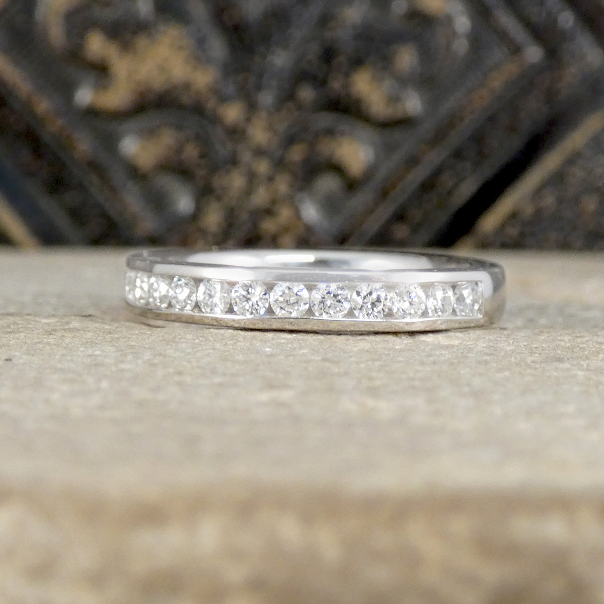 Platinum ring with diamond channel set into the band.