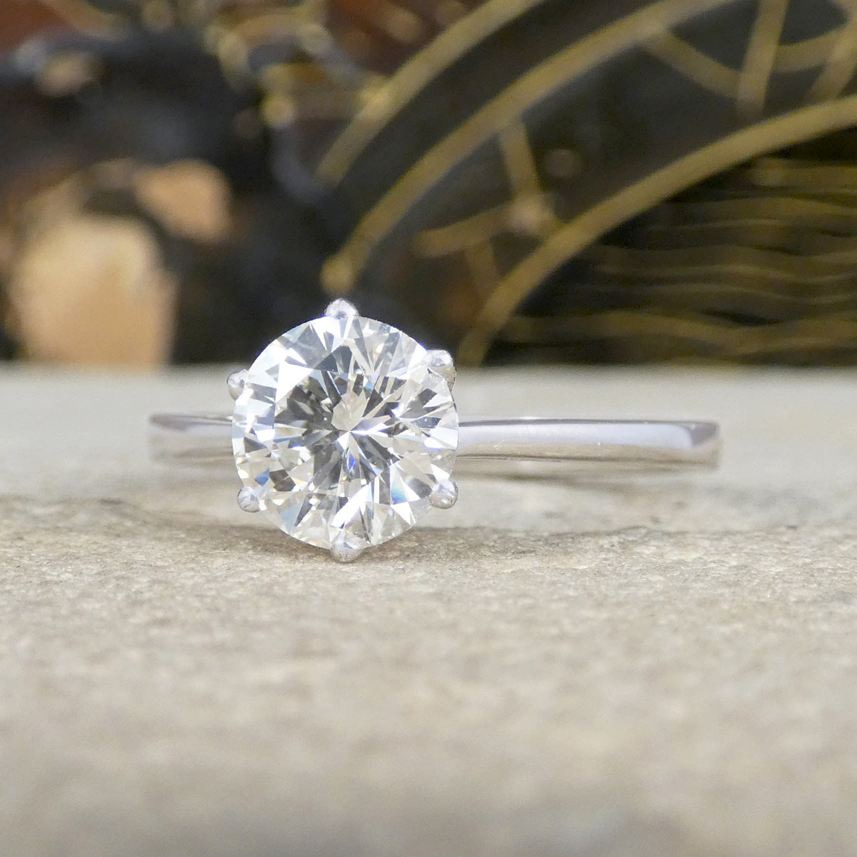 A classic and gorgeous 1.22ct Brilliant Cut Diamond solitaire engagement ring in a Platinum 6 claw setting. Showing a clear and bright diamond with a GIA cert.
