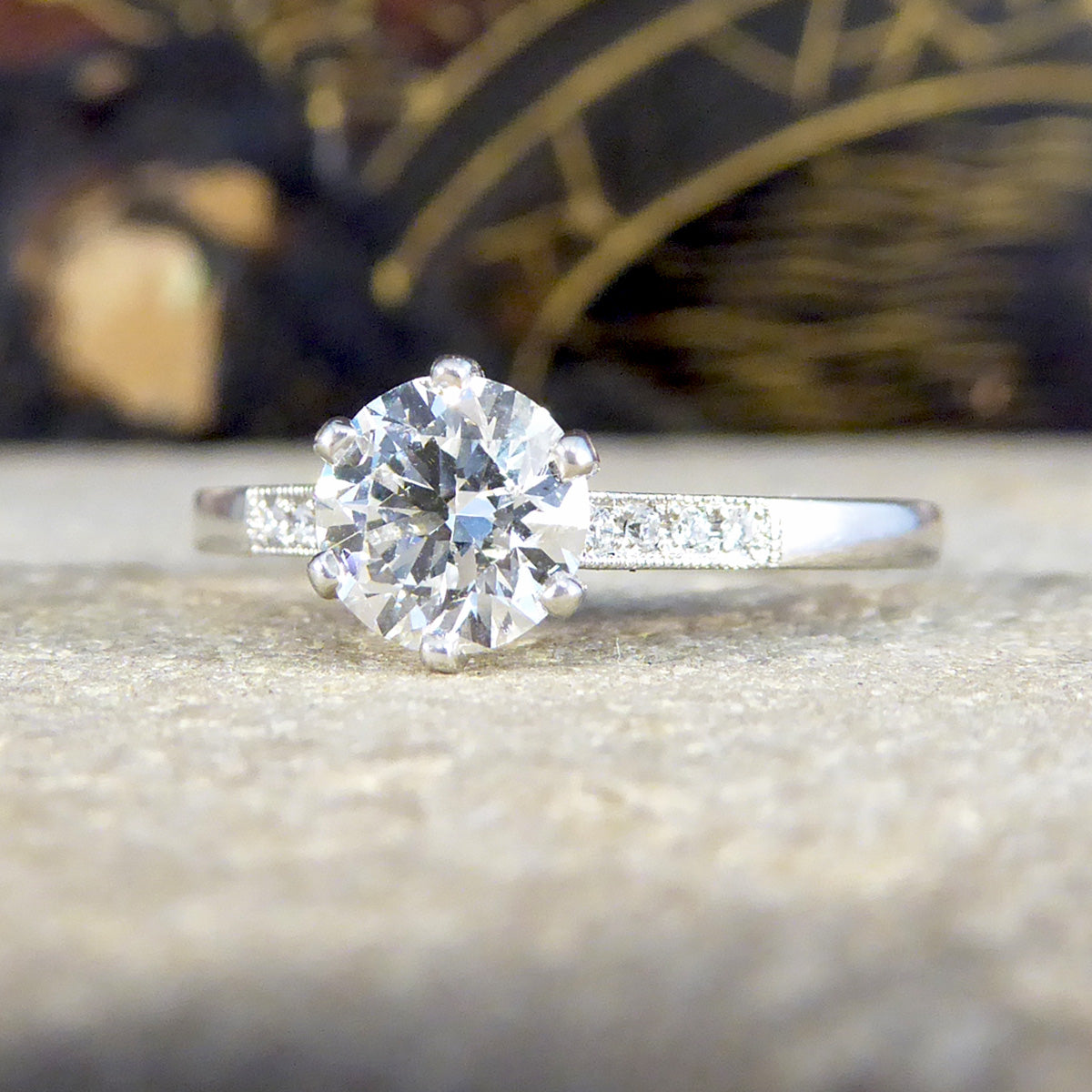 Diamond ring with a blurred decorative background