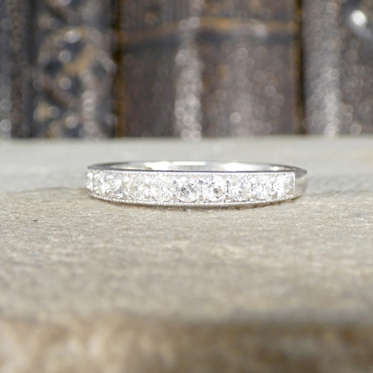 Diamond half eternity ring in 9ct white gold.