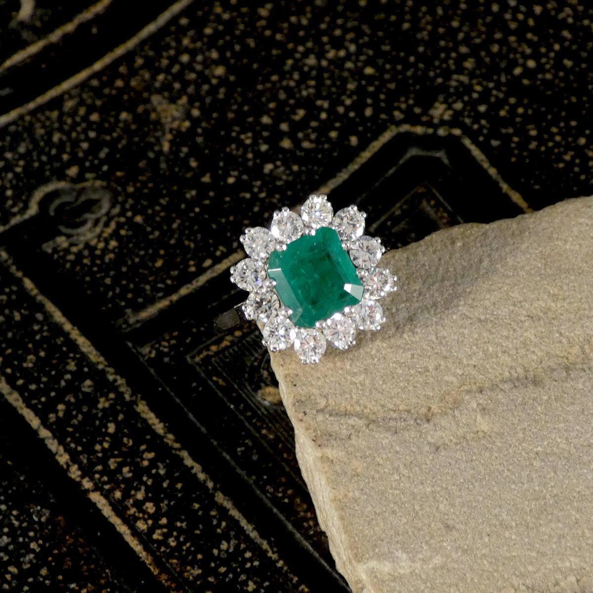The perfect burst of green set with a grand emerald centre and Diamond surround.