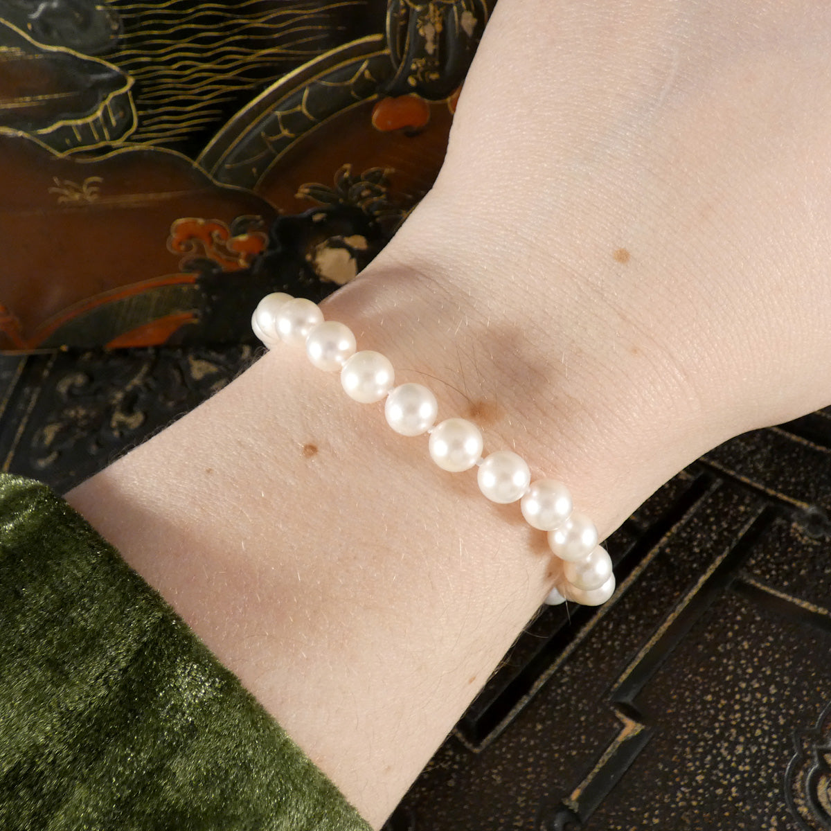 Akoya Cultured White Pearl Bracelet with 9ct Yellow Gold Clasp shown on arm to see how it would look when worn.