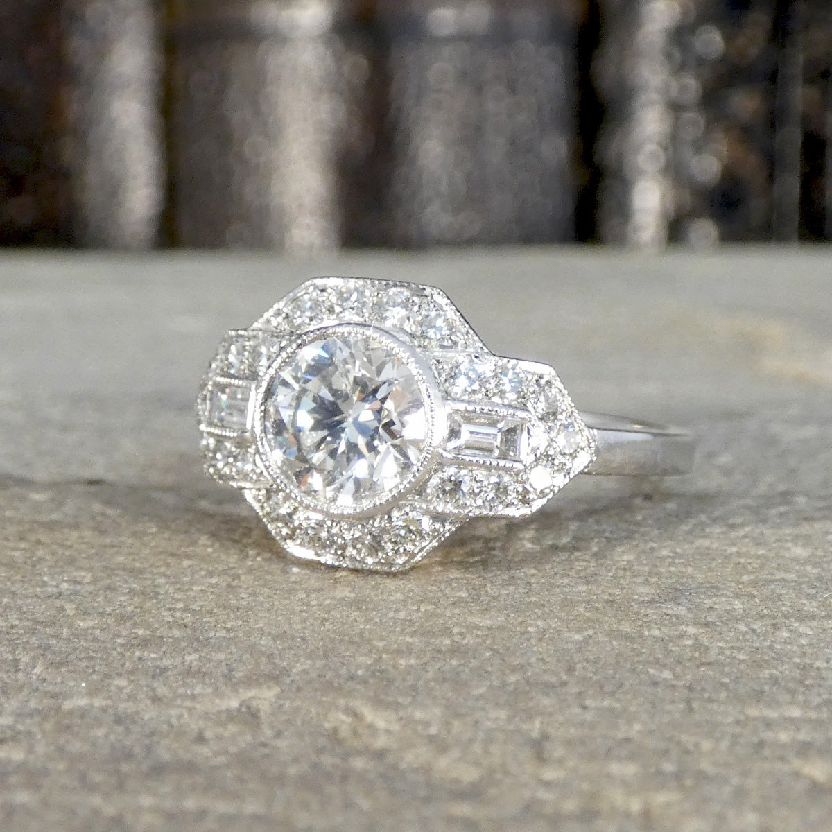 A gorgeous Art Deco inspired Diamond cluster ring in Platinum. Over one and hafl carats of diamond content.