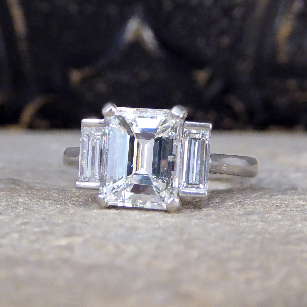 2.57ct Emerald and Baguette Cut Three Stone Ring in Platinum - Wharfedale Antiques