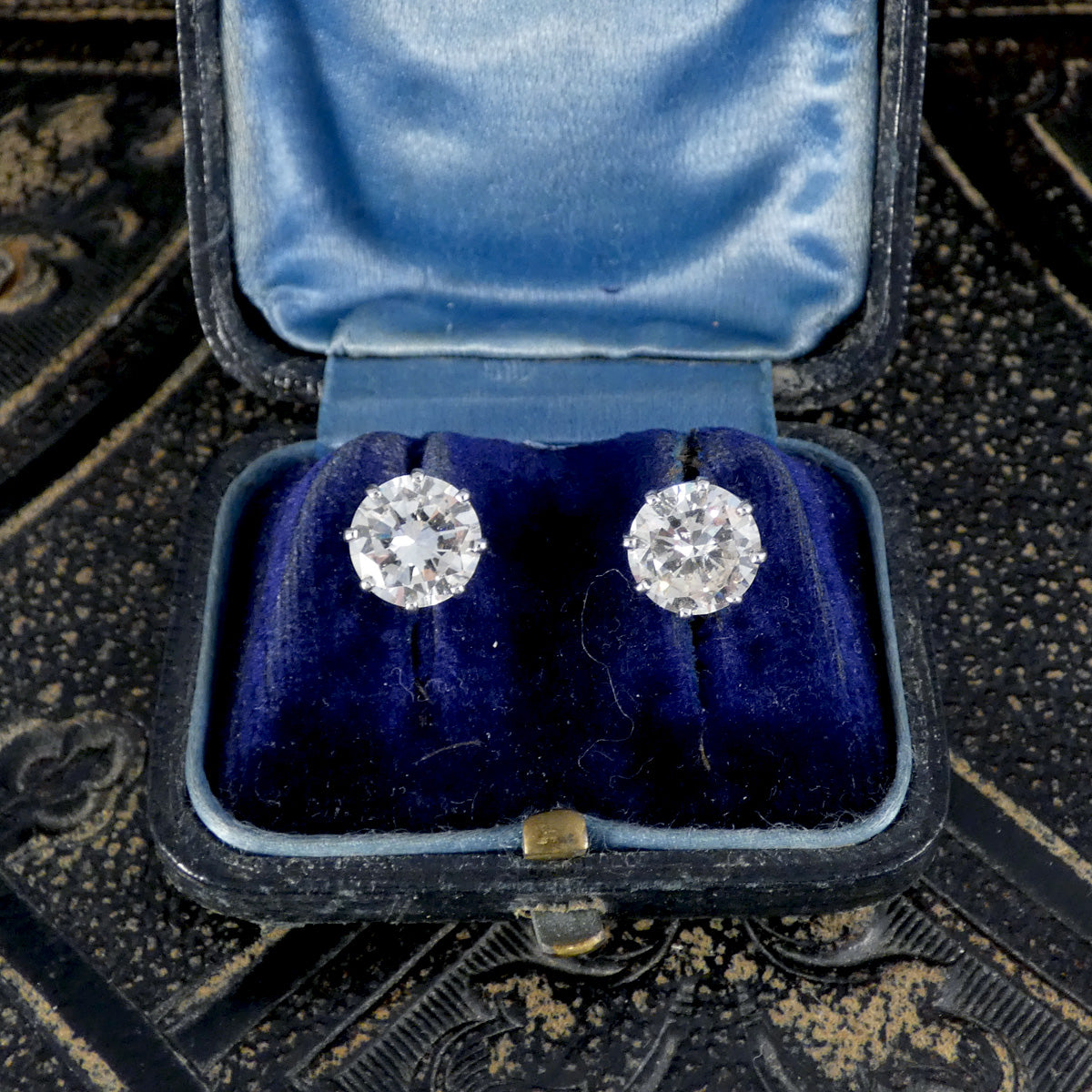 The perfect pair of diamond stud earrings in 18ct white gold displayed in a vintage box.