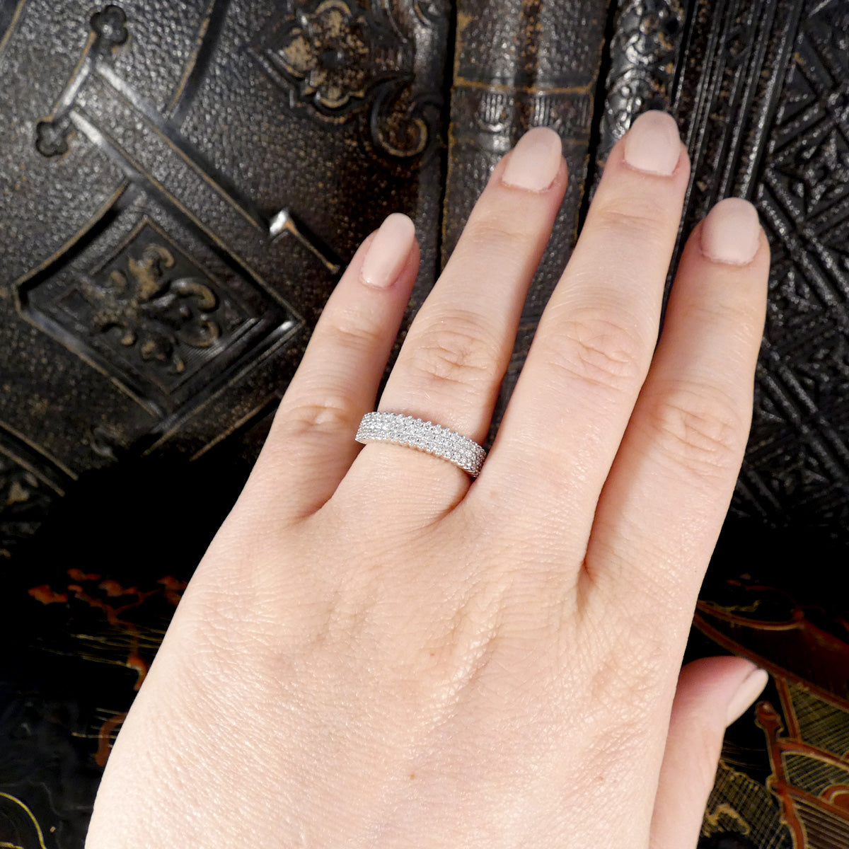 Brilliant Cut Diamond Three Row Half Eternity Ring in 18ct White Gold shown on the hand to see size and shape ratio.