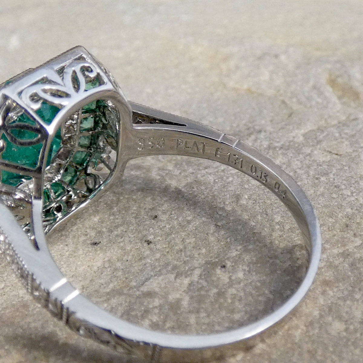 Diamond and Emerald weights engraved on the inner band showing quality in the craftmanship.