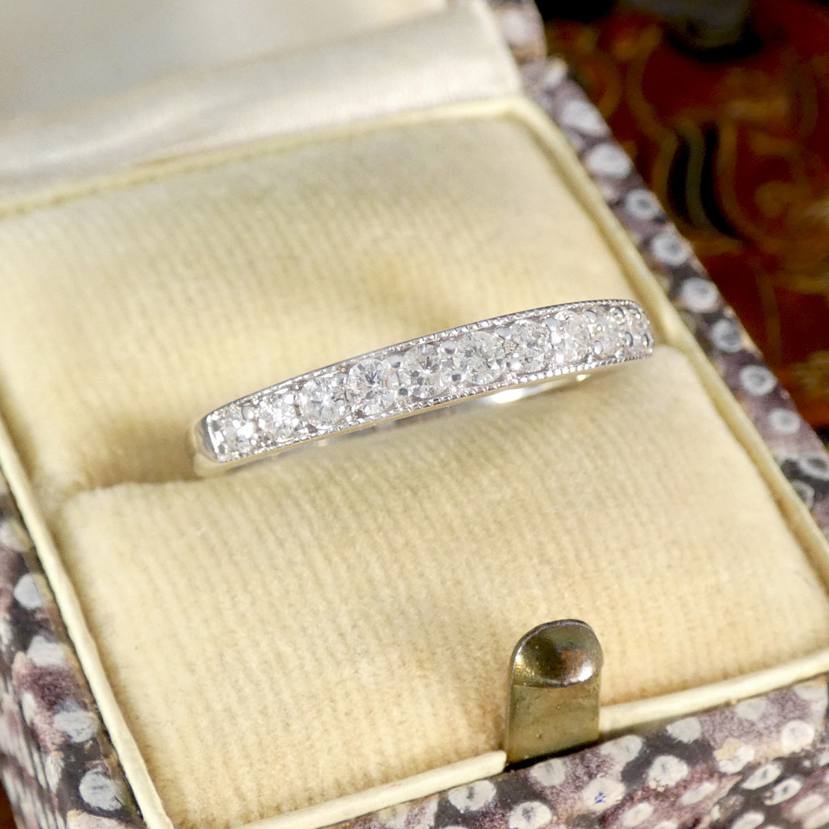 Diamond half eternity ring in 9ct white gold displayed in the vintage box.