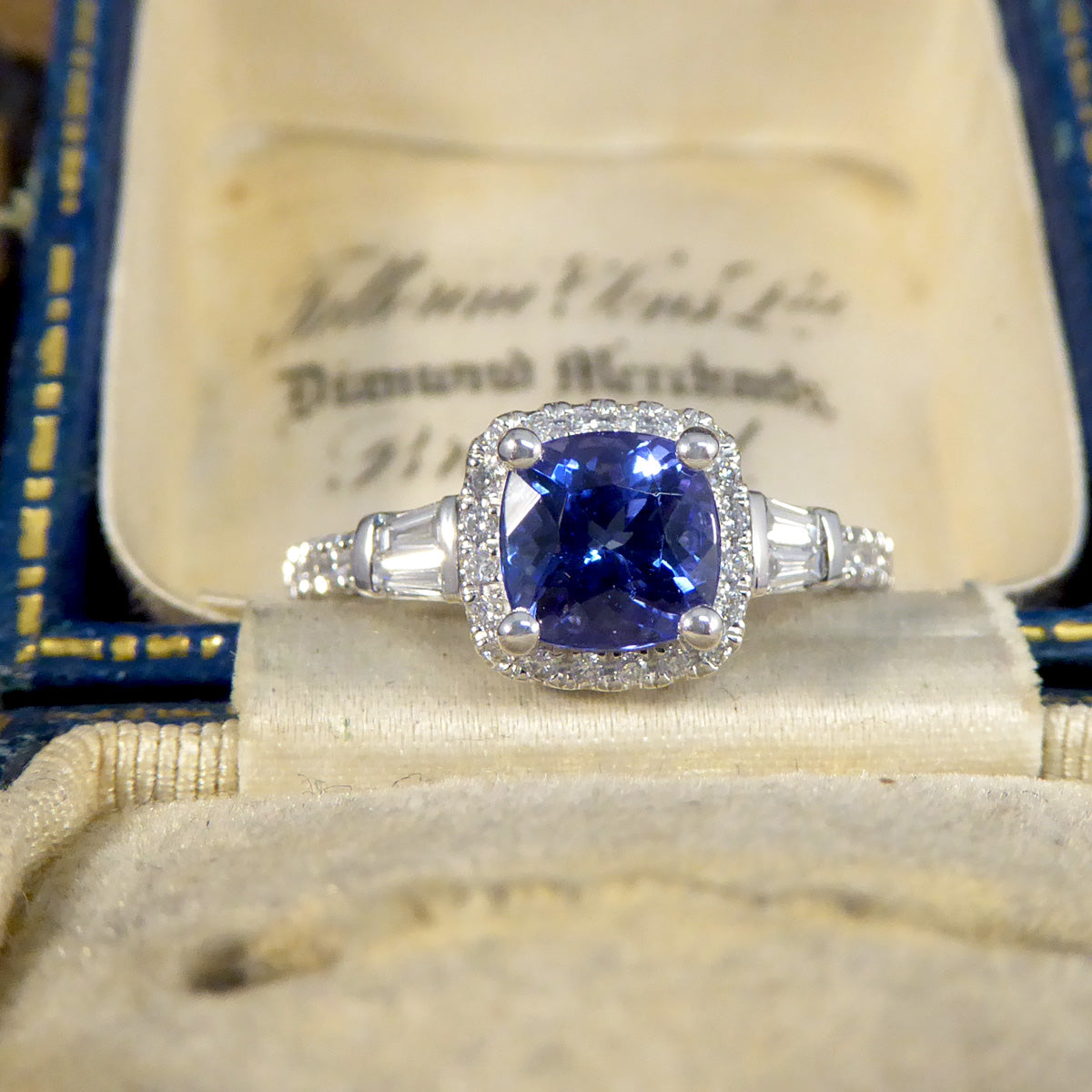 Cushion Cut Tanzanite and Diamond Cluster Ring with Tapered Baguette Shoulders in Platinum - Wharfedale Antiques