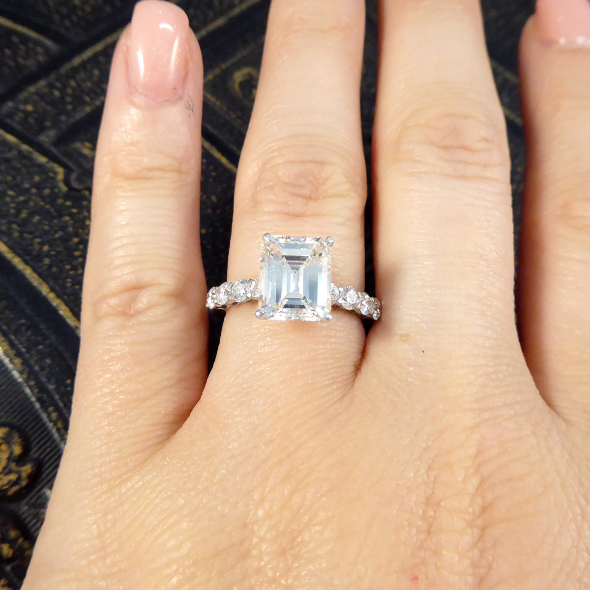 2.60ct Emerald Cut Diamond Solitaire Ring with 0.60ct Diamond Shoulders in Platinum - Wharfedale Antiques