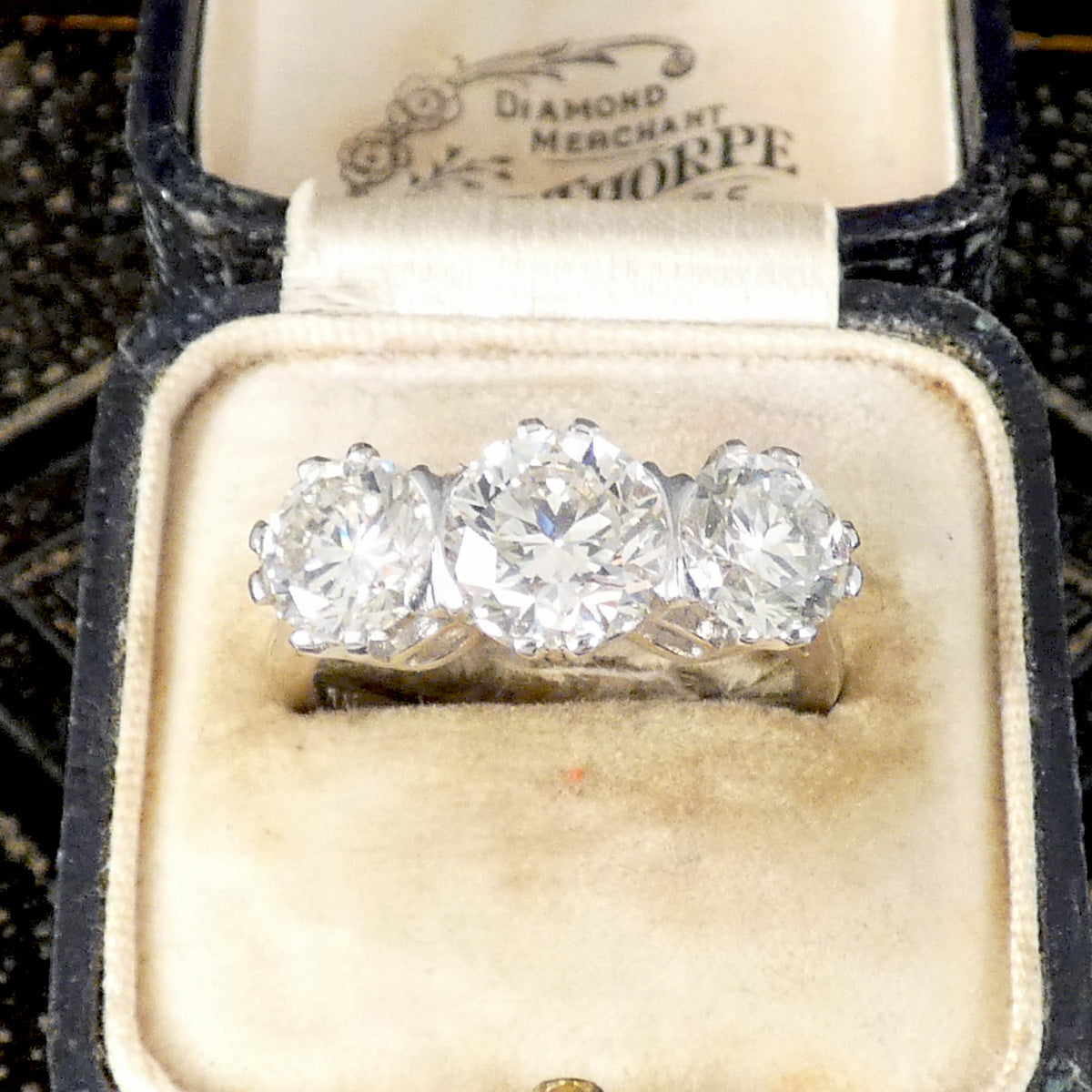 3.88ct Diamond Three Stone Trilogy Ring in Platinum displayed in vintage box.