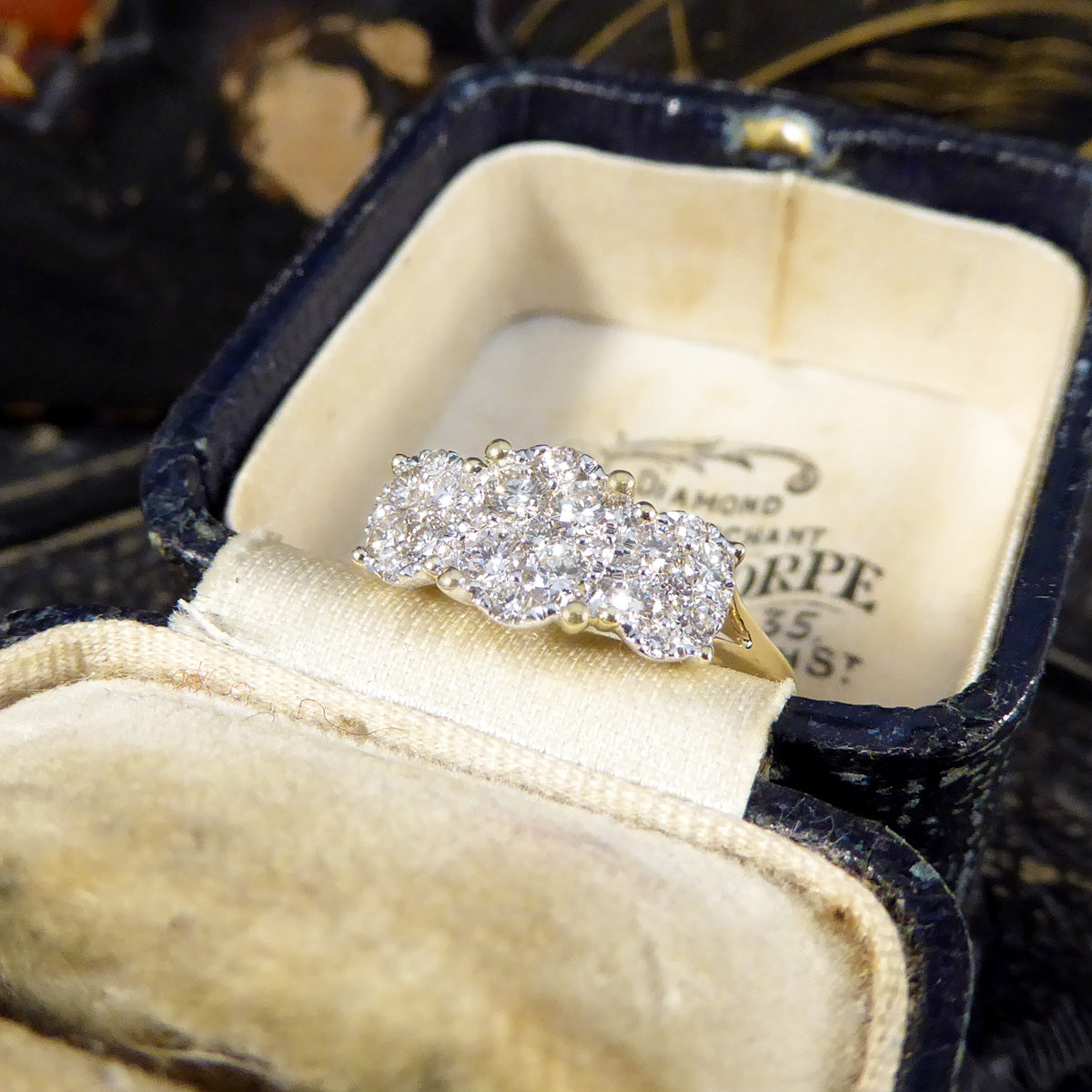 Oval Cut Diamond Three Stone Illusion Cluster Ring in Yellow Gold - Wharfedale Antiques