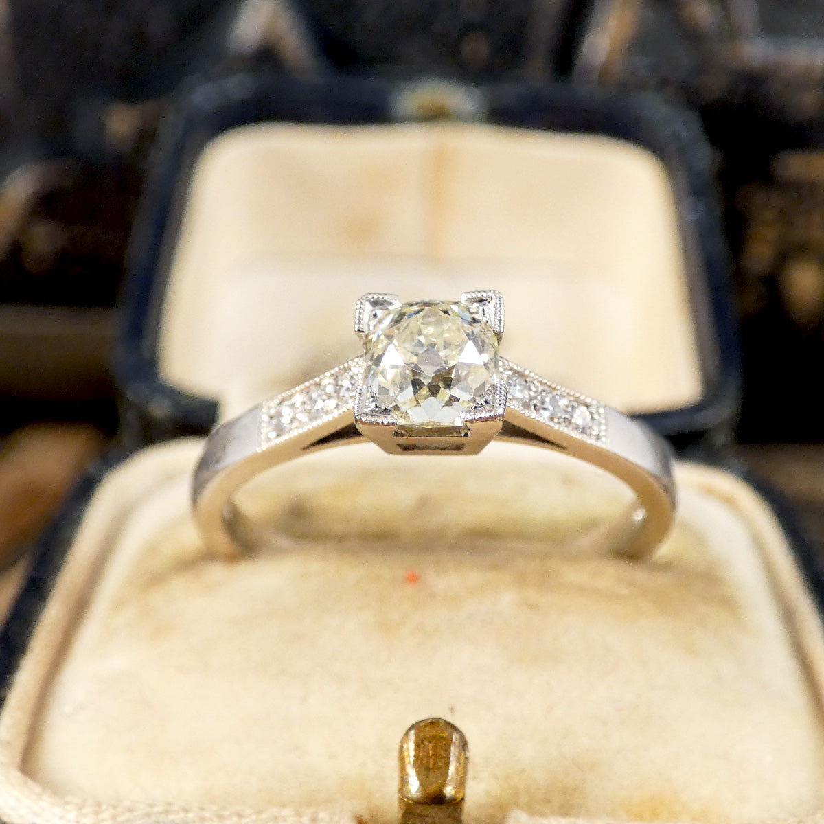 Champagne Old Cushion Cut Diamond Solitaire with Diamond set Shoulders in Platinum - Wharfedale Antiques
