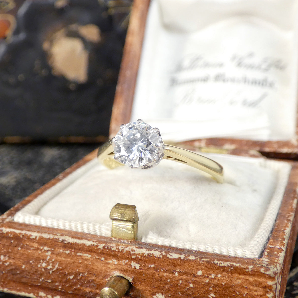 Vintage Diamond Solitaire Ring in 18ct White and Yellow Gold shown in vintage box.