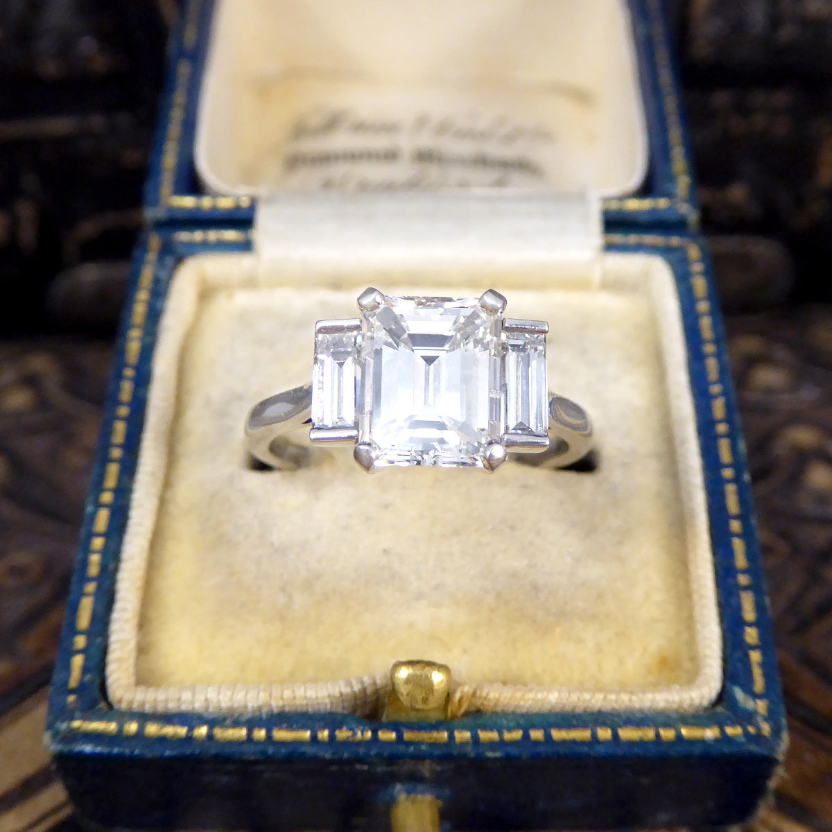2.57ct Emerald and Baguette Cut Three Stone Ring in Platinum - Wharfedale Antiques