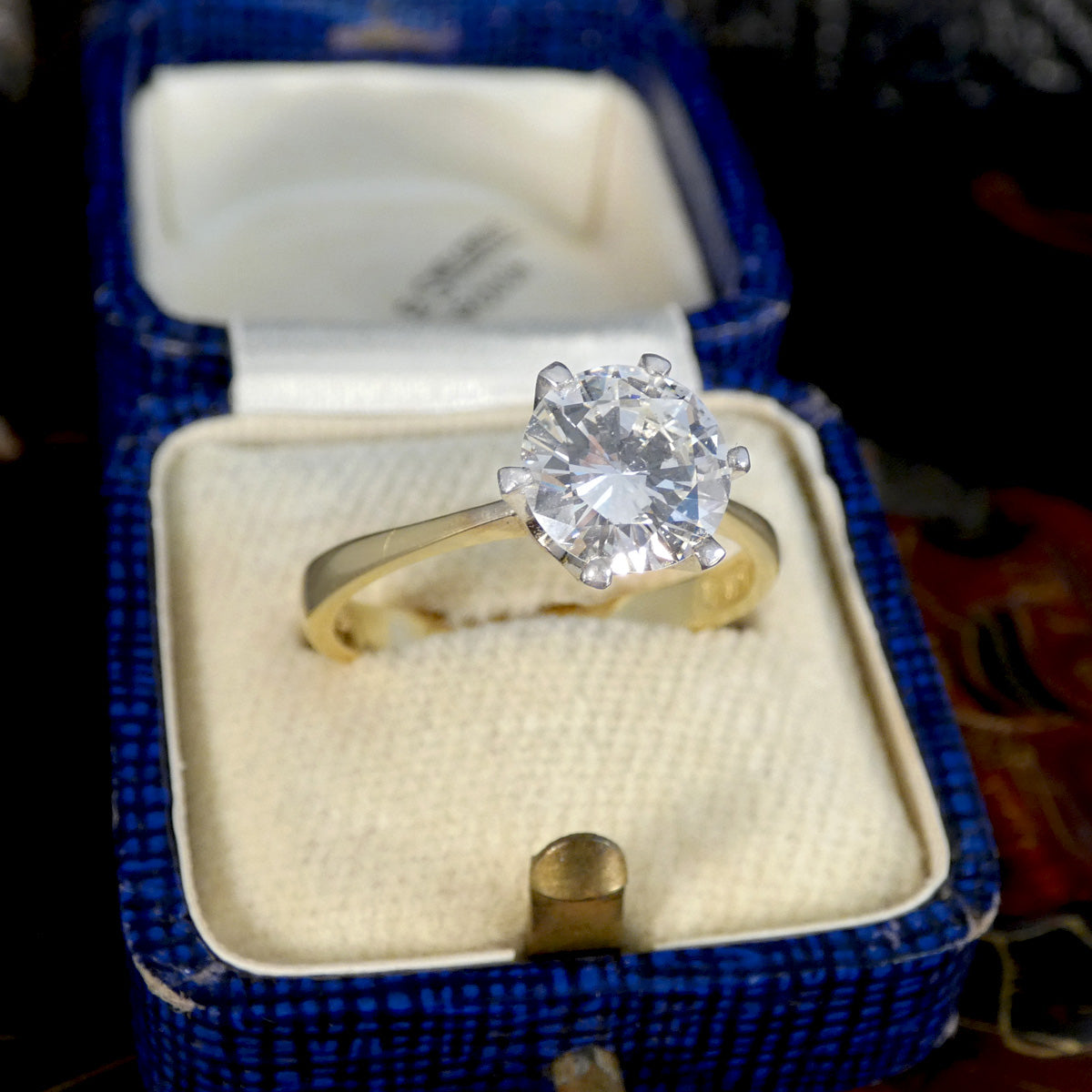 A gorgeous diamond set solitaire engagement ring in yellow and white gold.