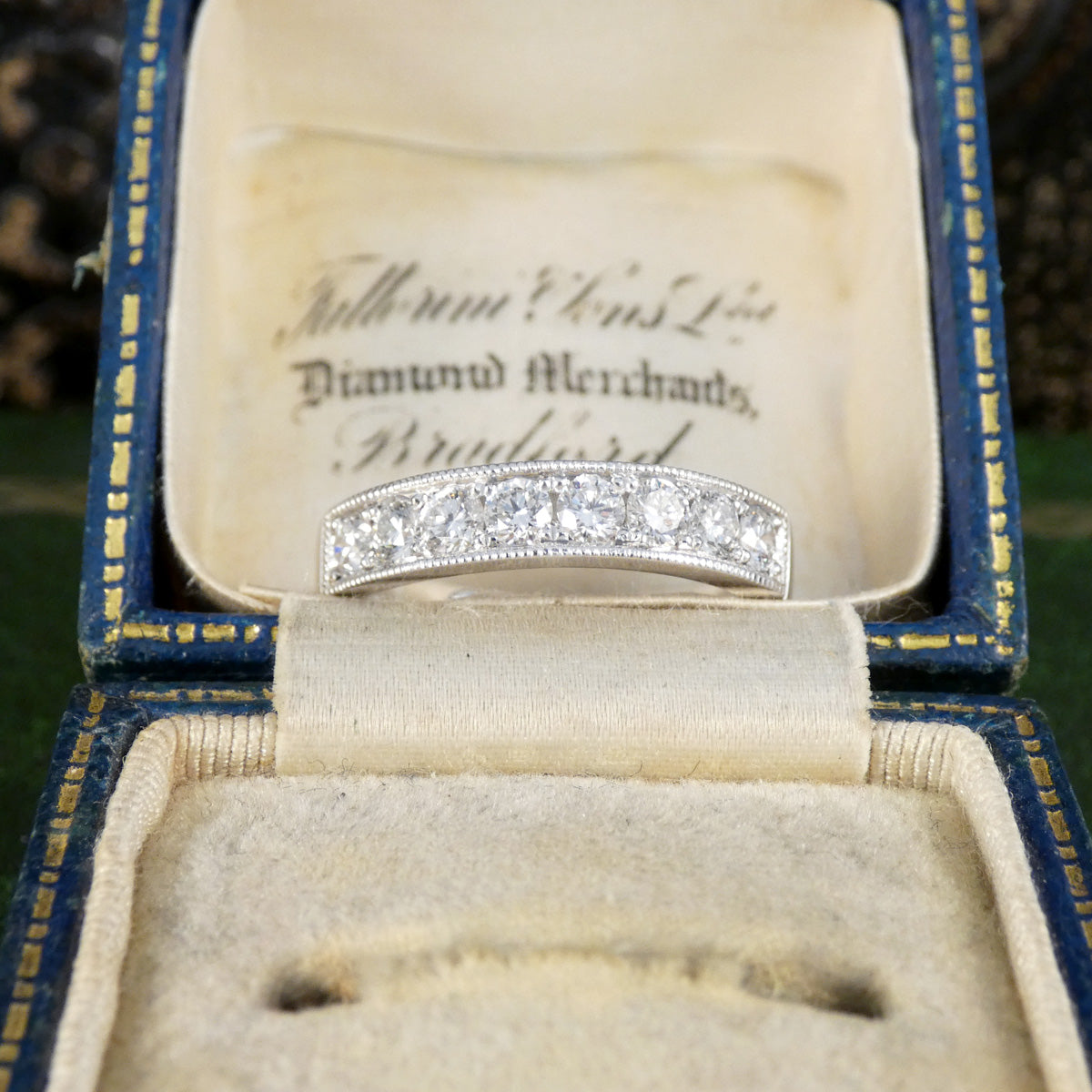 Diamond ring in an open jewellery box.