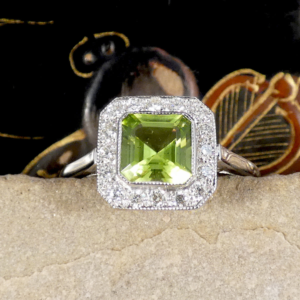 Art Deco Style Peridot and Diamond Cluster Ring in Platinum.