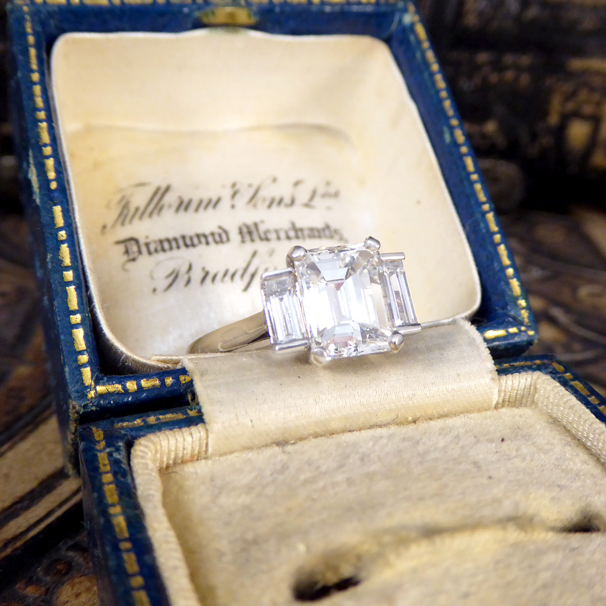 2.57ct Emerald and Baguette Cut Three Stone Ring in Platinum - Wharfedale Antiques