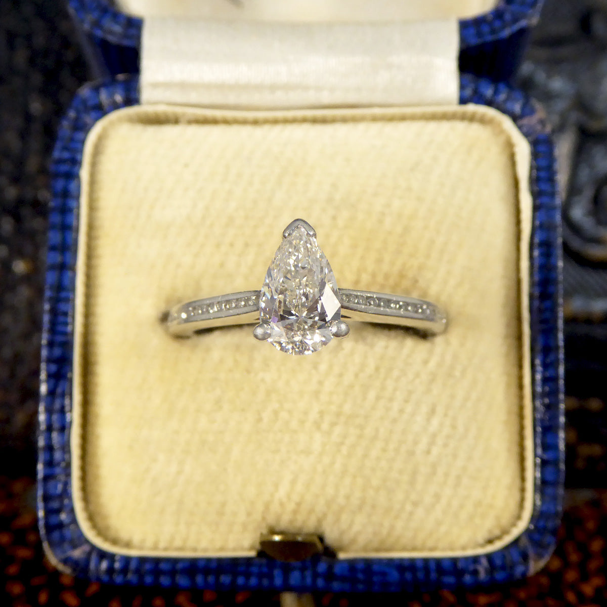 GIA Cert Pear Cut Diamond Engagement Ring with Diamond Shoulder in Platinum