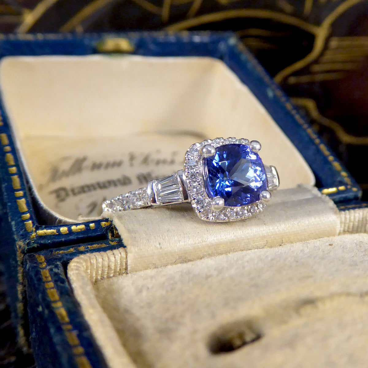 Cushion Cut Tanzanite and Diamond Cluster Ring with Tapered Baguette Shoulders in Platinum - Wharfedale Antiques