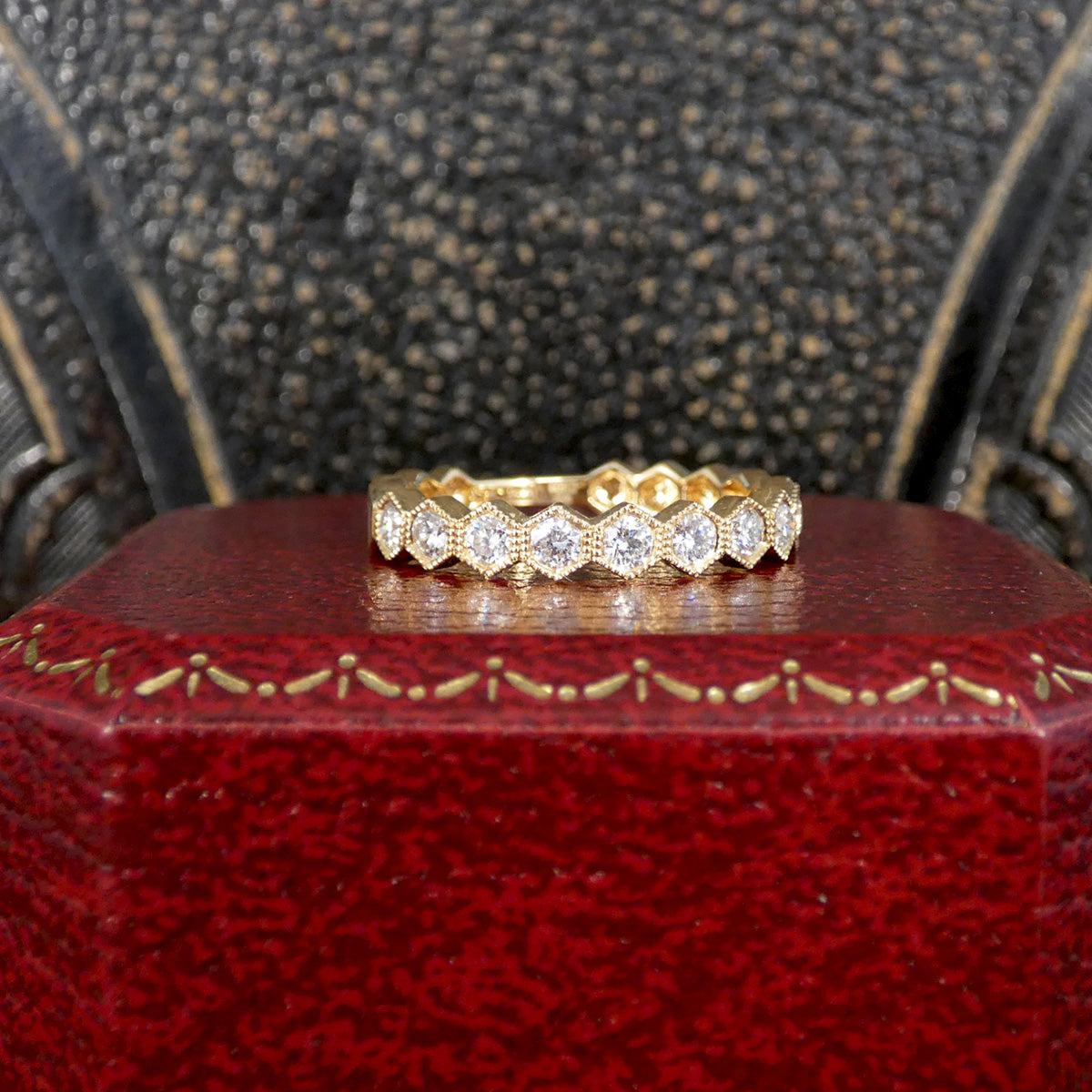 Honeycomb Diamond Half Eternity Ring in 18ct Yellow Gold shown on a red box