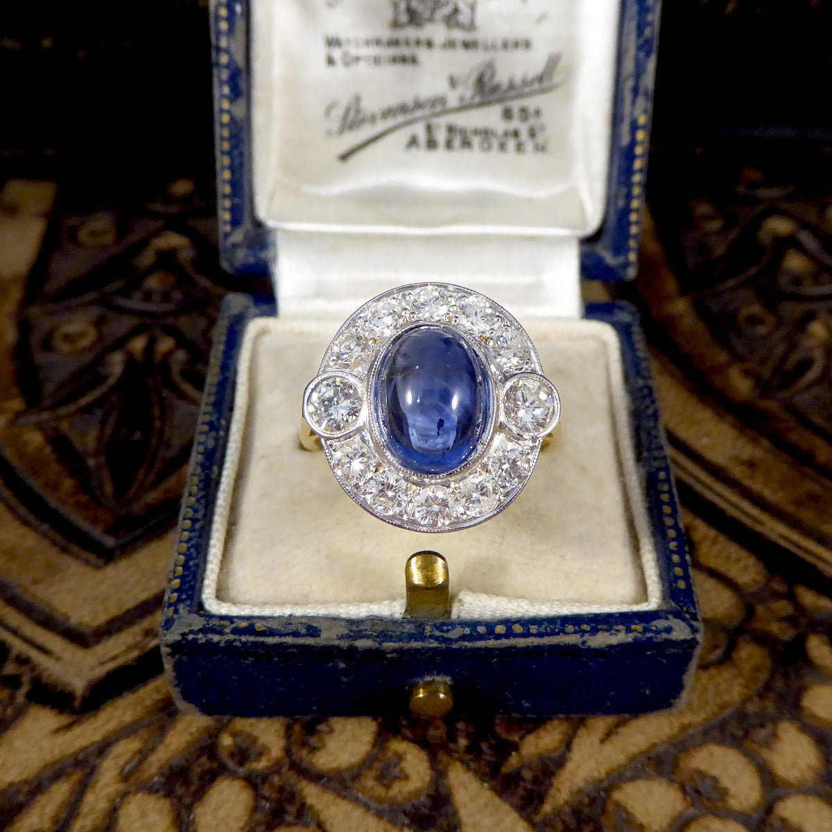 Cabochon Cut Sapphire and Diamond Cluster Ring in 18ct Gold