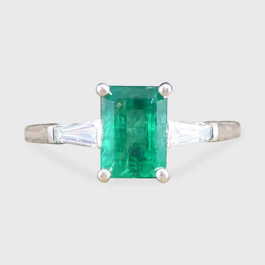 1.03ct Emerald Cut Emerald Ring with Tapered Baguette Cut Diamond Shoulders in Platinum - Wharfedale Antiques