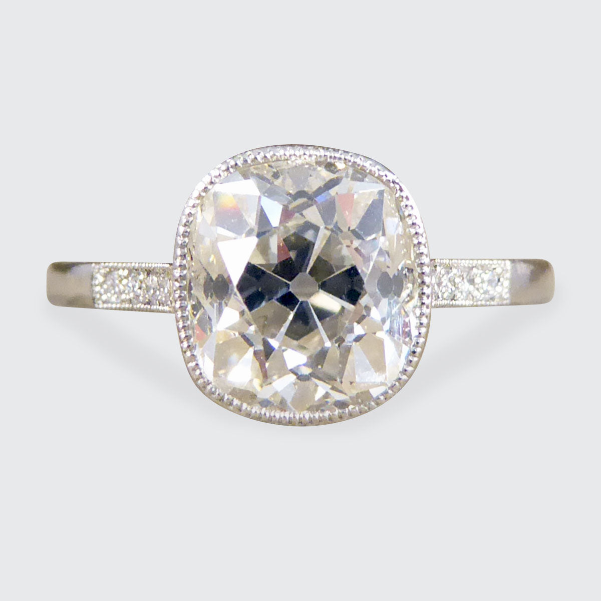 2.35ct Old Cushion Cut Diamond Collar Set Solitaire Engagement Ring with Diamond Shoulders in Platinum - Wharfedale Antiques