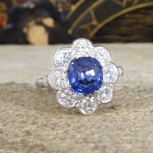 Contemporary Edwardian Style 1.50ct Sapphire and 1.10ct Diamond Cluster Ring in Platinum - Wharfedale Antiques