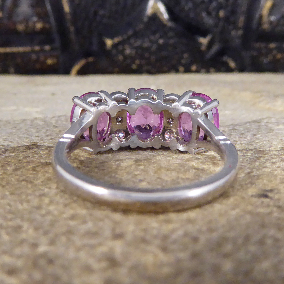 Pink Sapphire Three Stone Ring with Diamond Spacers in 18ct White Gold - Wharfedale Antiques
