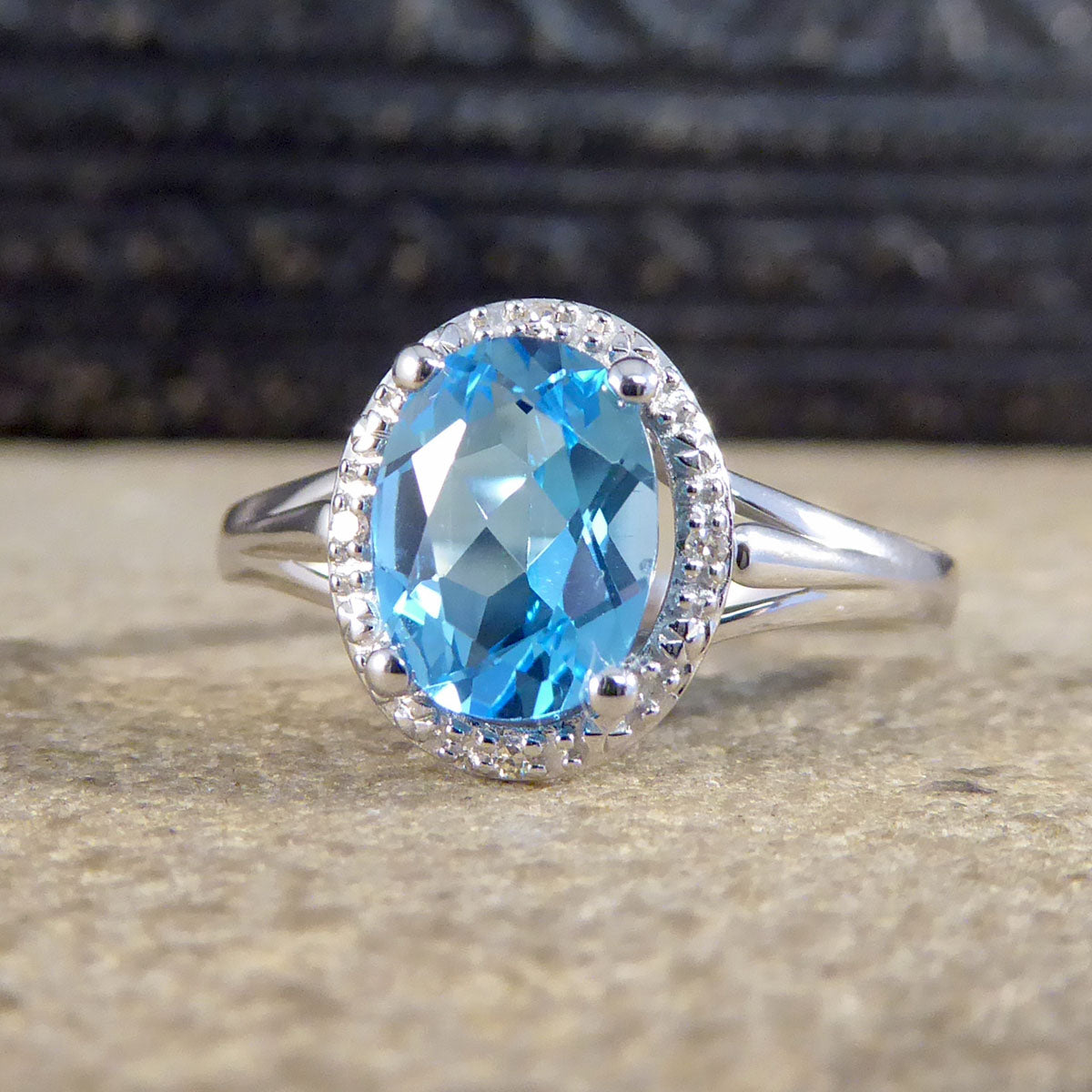 Oval Blue Topaz and Diamond Illusion Halo Cluster Ring in White Gold - Wharfedale Antiques