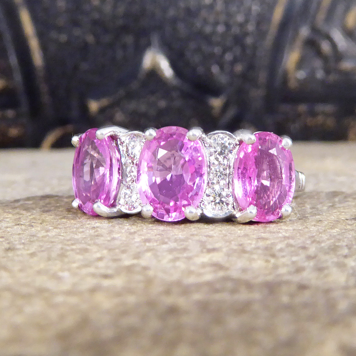 Pink Sapphire Three Stone Ring with Diamond Spacers in 18ct White Gold - Wharfedale Antiques