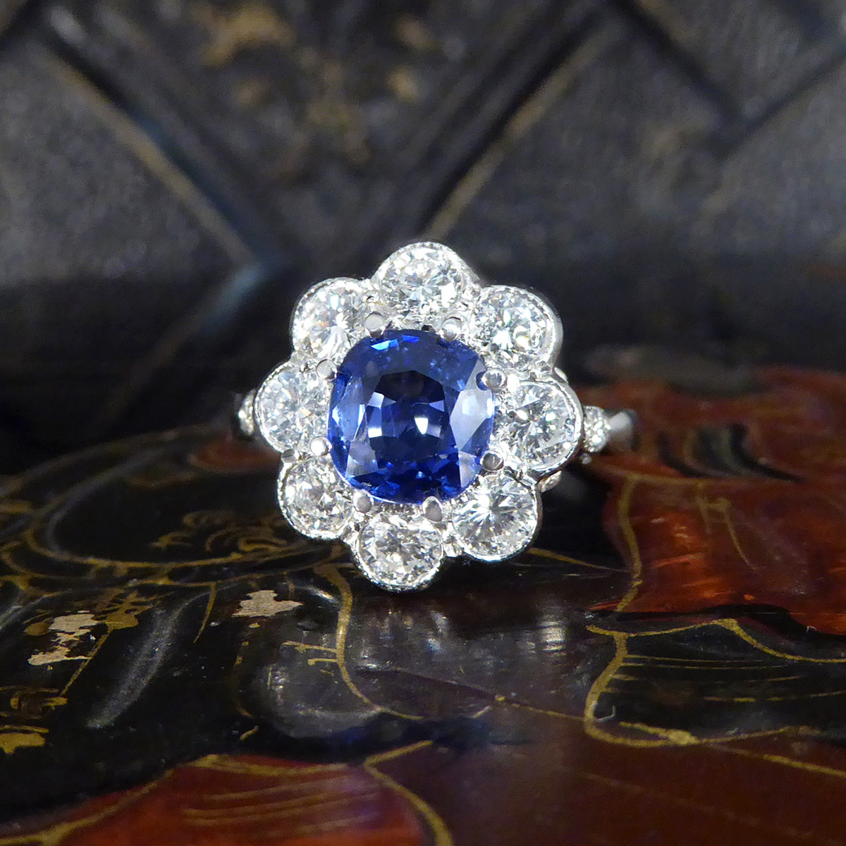 Contemporary Edwardian Style 1.50ct Sapphire and 1.10ct Diamond Cluster Ring in Platinum - Wharfedale Antiques