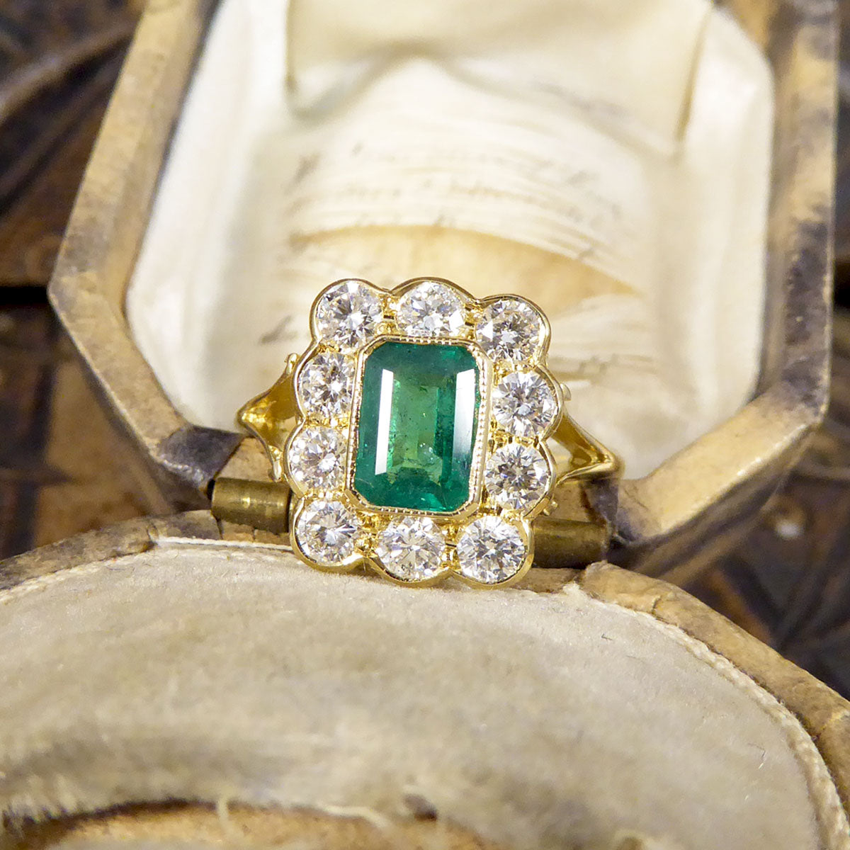 Contemporary Edwardian Style 0.90ct Emerald and 0.90ct Diamond Cluster Ring in 18ct Yellow Gold