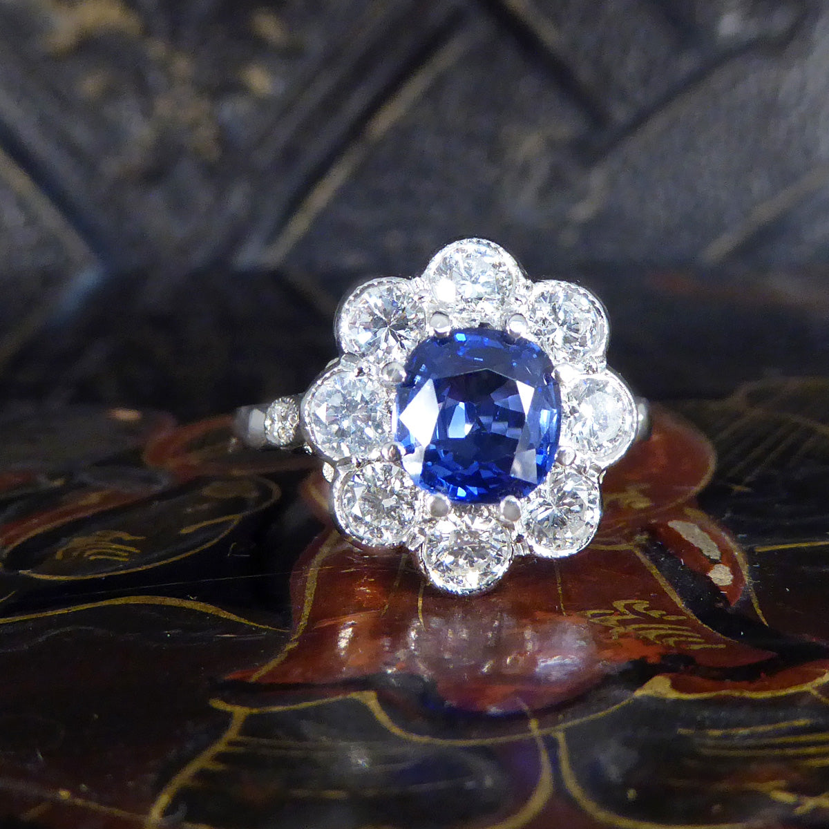 Contemporary Edwardian Style 1.50ct Sapphire and 1.10ct Diamond Cluster Ring in Platinum - Wharfedale Antiques