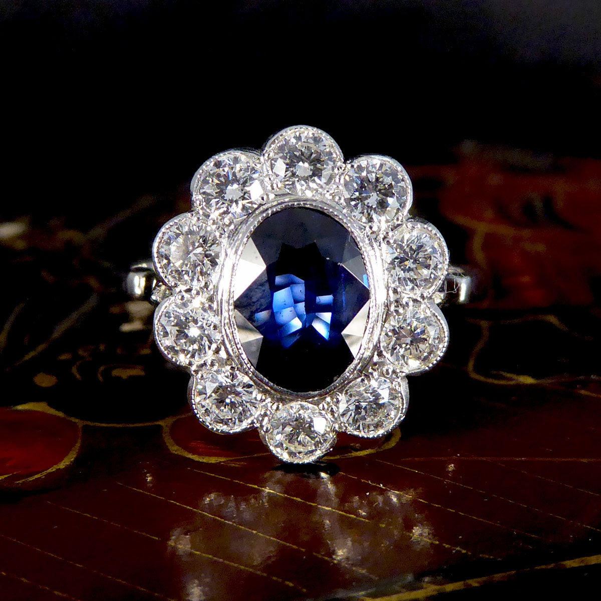 2.07ct Sapphire and 0.95ct Total Diamond Cluster Ring in Platinum - Wharfedale Antiques