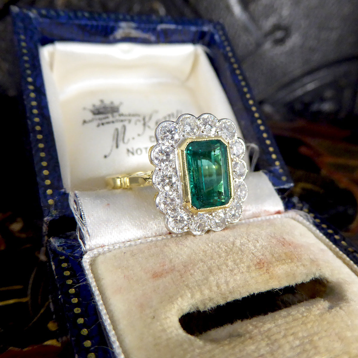 Contemporary Edwardian Style 2.50ct Emerald and 1.20ct Diamond Cluster Ring in 18ct Gold - Wharfedale Antiques