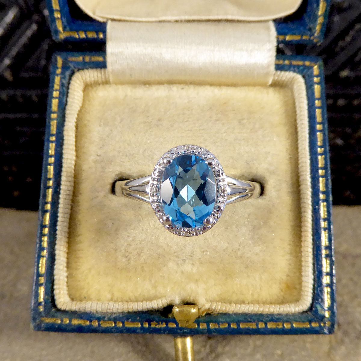 Oval Blue Topaz and Diamond Illusion Halo Cluster Ring in White Gold - Wharfedale Antiques