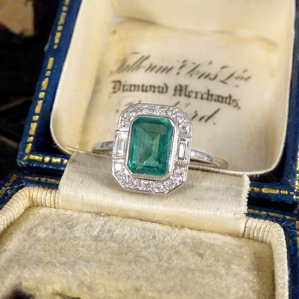 Art Deco Inspired 0.90ct Emerald and Diamond Cluster Ring in Platinum - Wharfedale Antiques