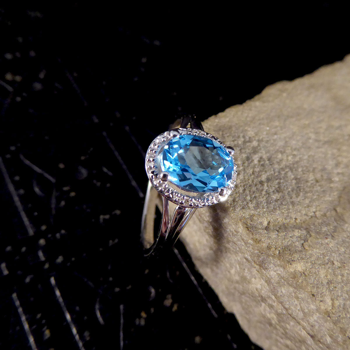 Oval Blue Topaz and Diamond Illusion Halo Cluster Ring in White Gold - Wharfedale Antiques