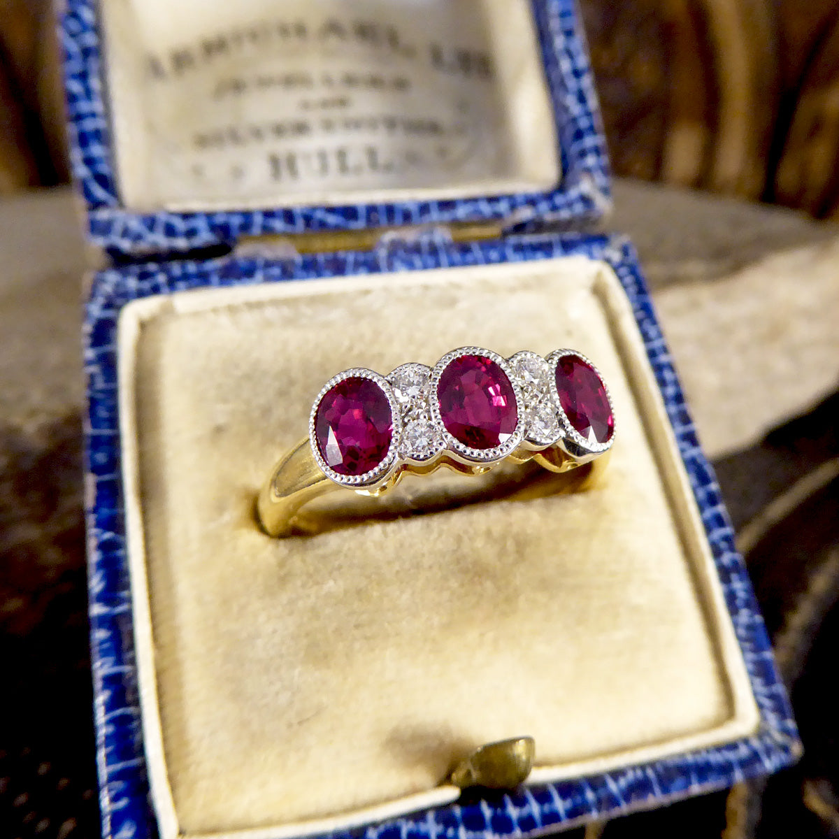 Quality Burma Ruby Three Stone Ring with Diamond Spacers in 18ct Yellow and White Gold - Wharfedale Antiques