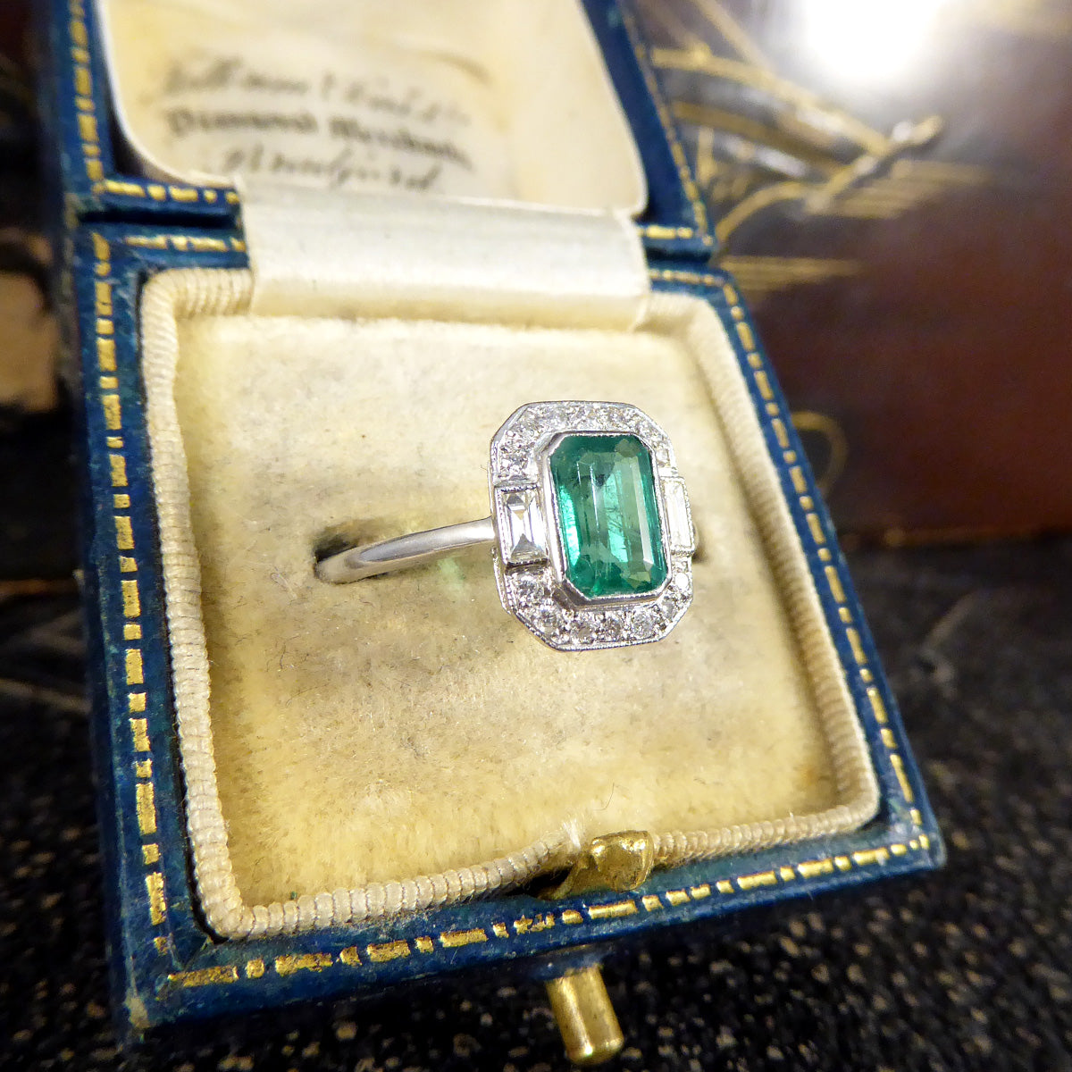 Art Deco Inspired 0.90ct Emerald and Diamond Cluster Ring in Platinum - Wharfedale Antiques