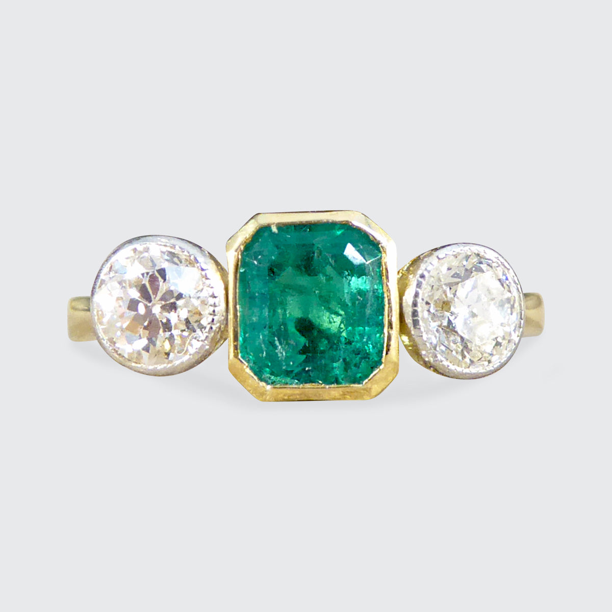 Emerald and Diamond Bezel Set Three Stone Ring in 18ct Yellow Gold and Platinum - Wharfedale Antiques
